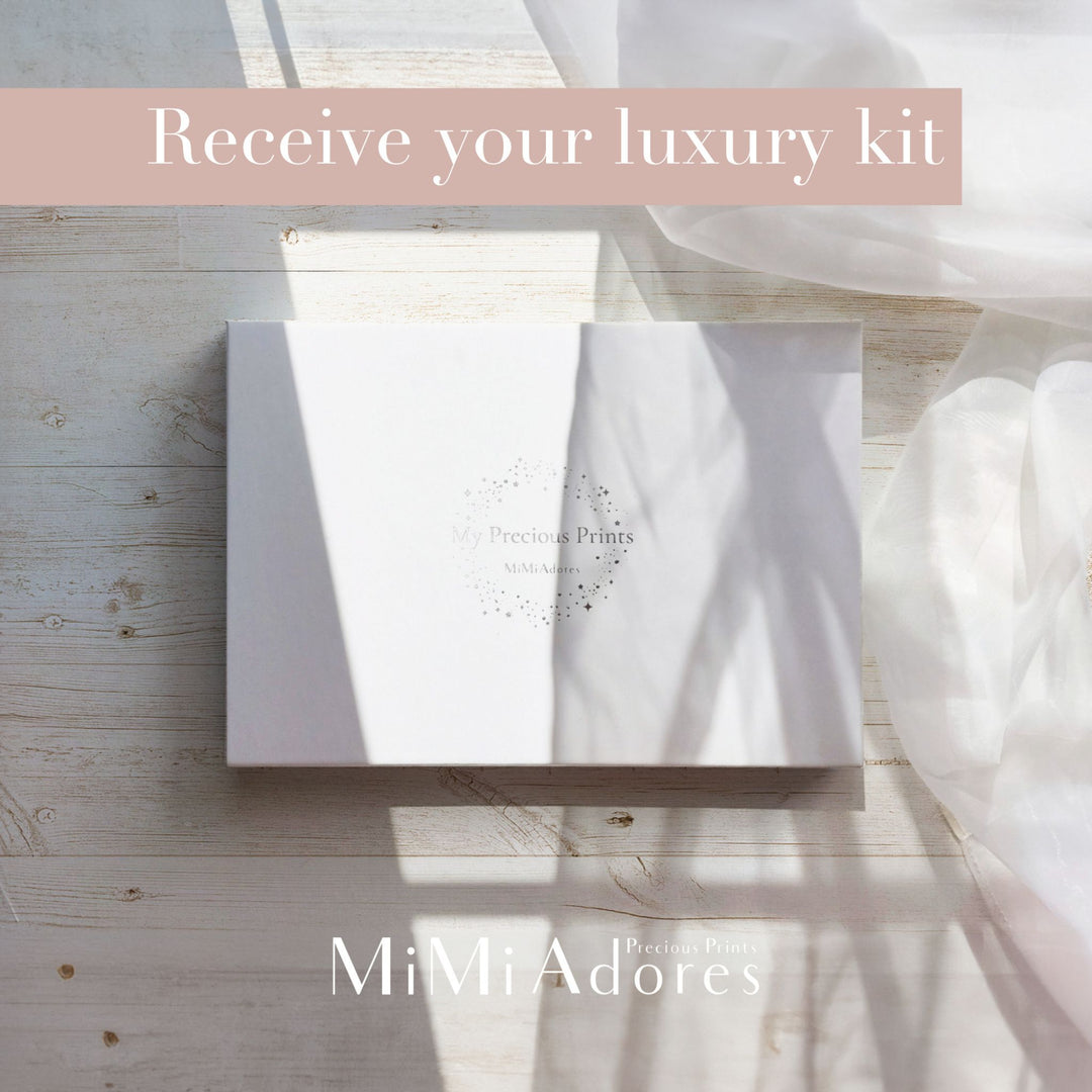 A gift box which contains a baby inkless wipe kit which can be used from birth to create the most detailed baby prints!