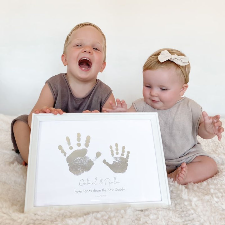 Sibling handprint art in real foil